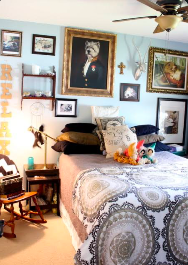 Vintage-inspired bedroom with dog portrait art