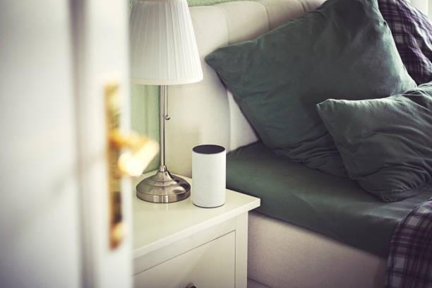Smart speaker in the bedroom on the bedside table.