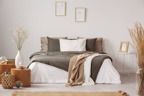 Spacious bedroom interior in beige and olive color