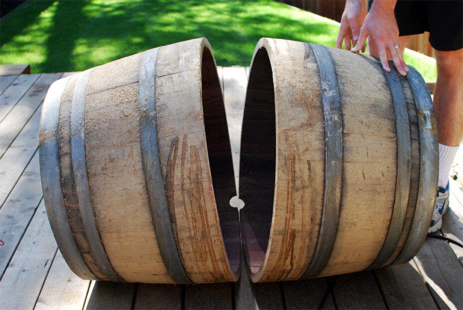 A wine barrel cut in half, ready for a DIY project