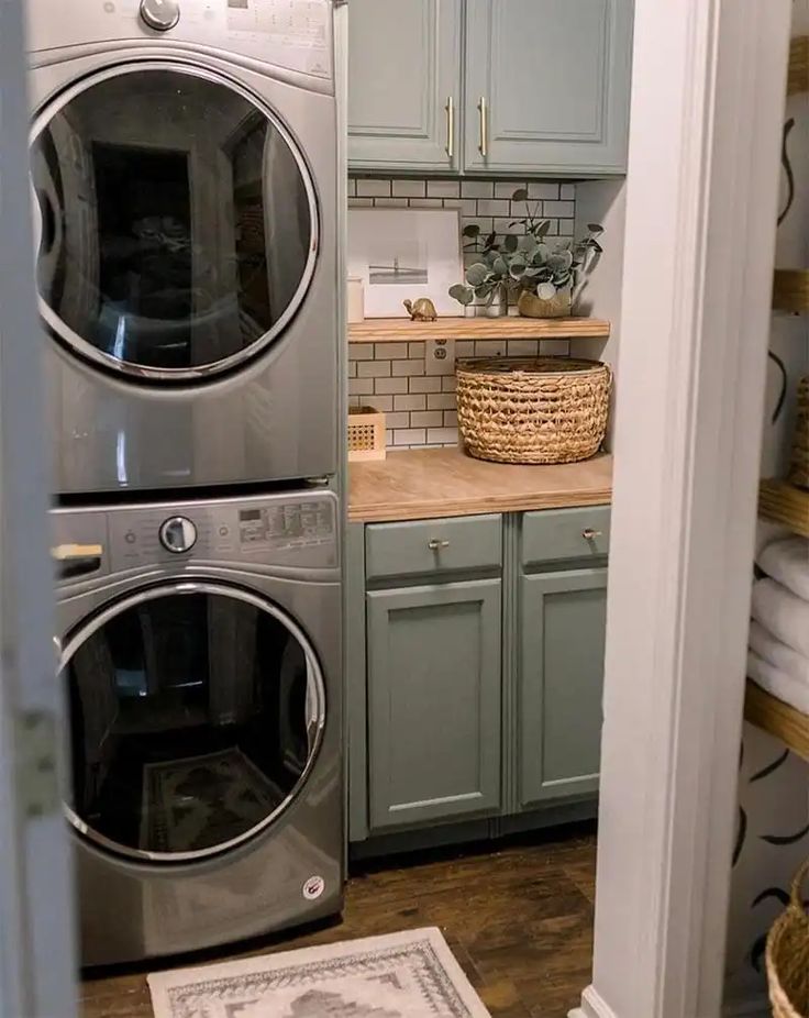 Stacked washer-dryer set in a laundry room.