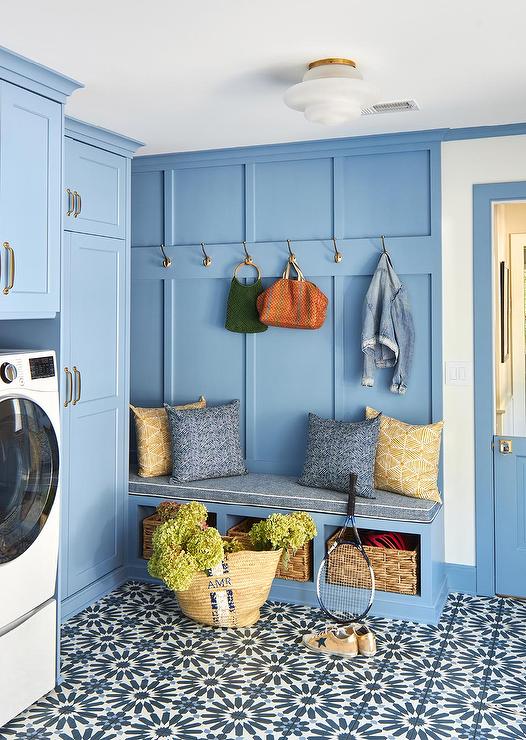 Laundry room in blue mudroom.