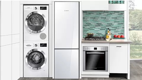 Washer-dryer set in kitchen.