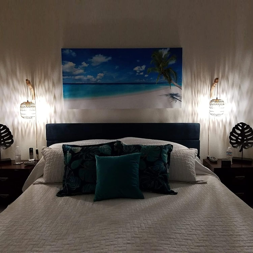 Frideko Plug in Wall Sconces Set on either side of a bed.