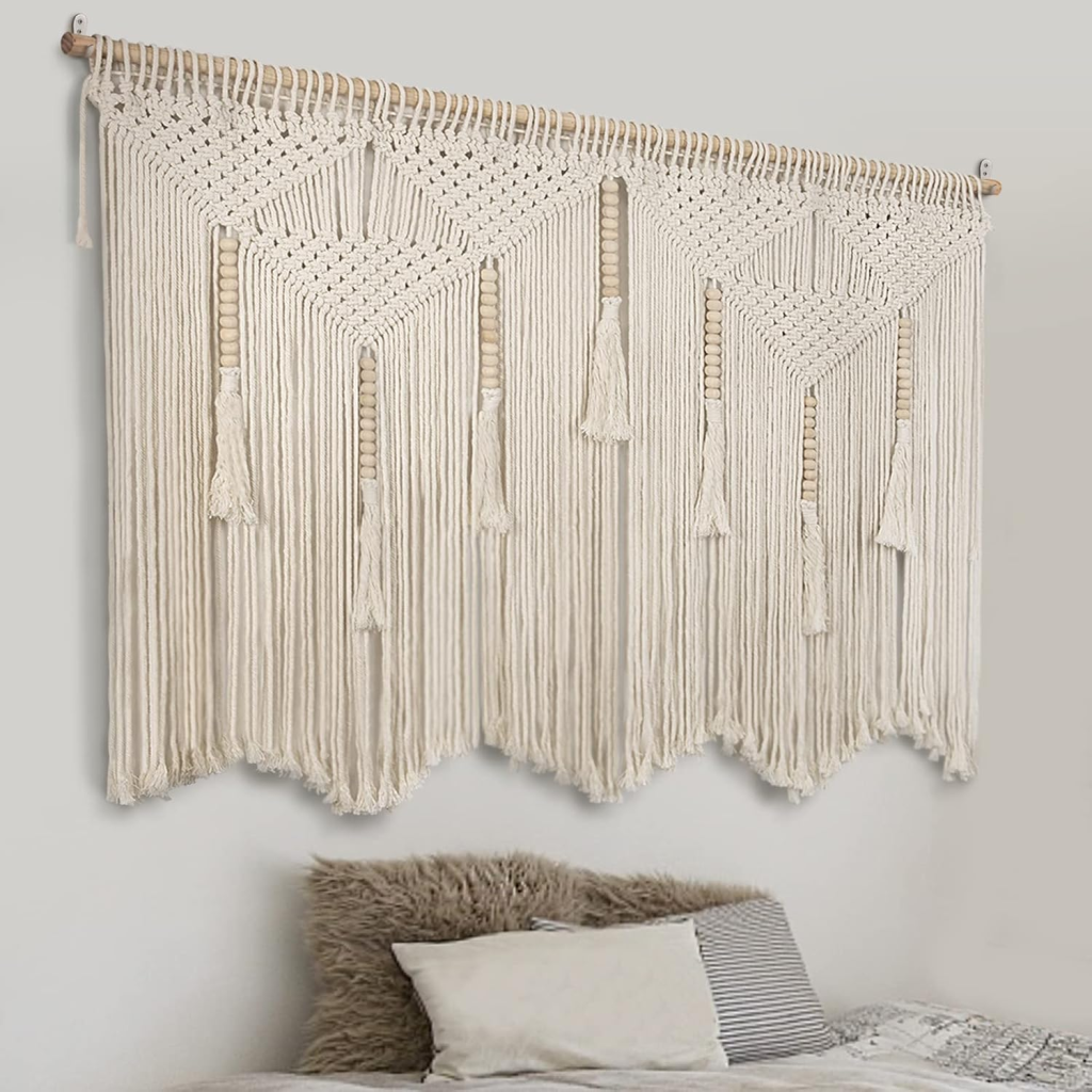 Large Macrame Boho Tapestry hanging over a bed.