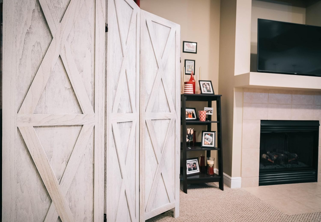 ompact home workspace in a living room with shelves and a computer desk