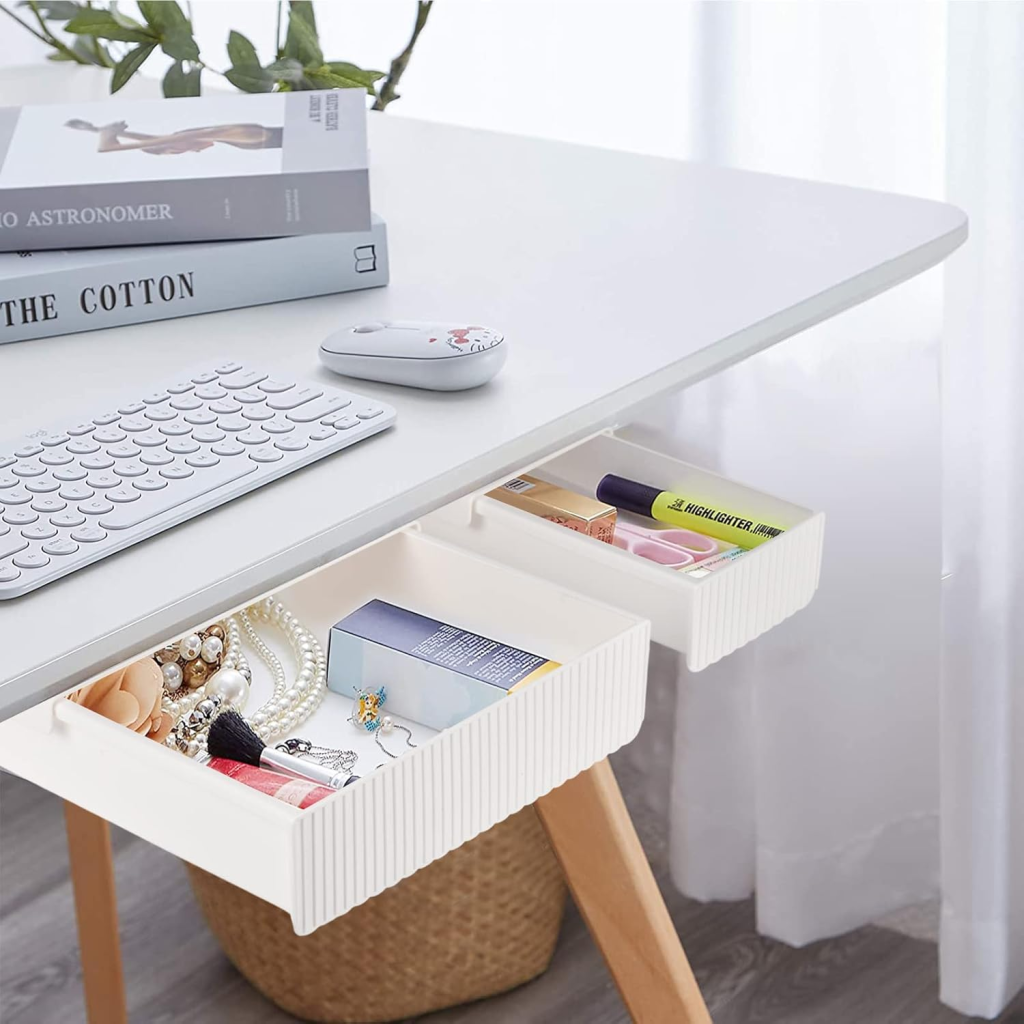 Minimalist white desk with sliding mesh drawers for organized storage.
