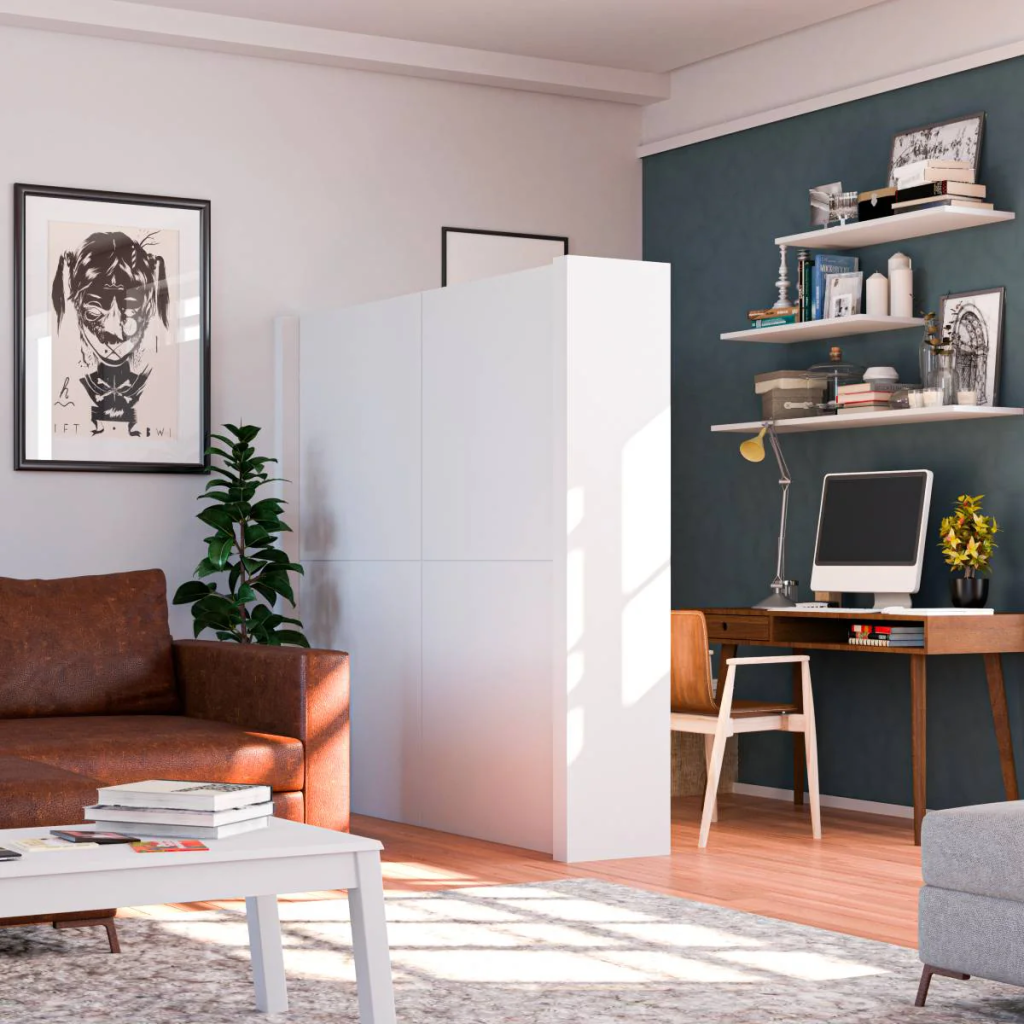 Compact home workspace in a living room with shelves and a computer desk