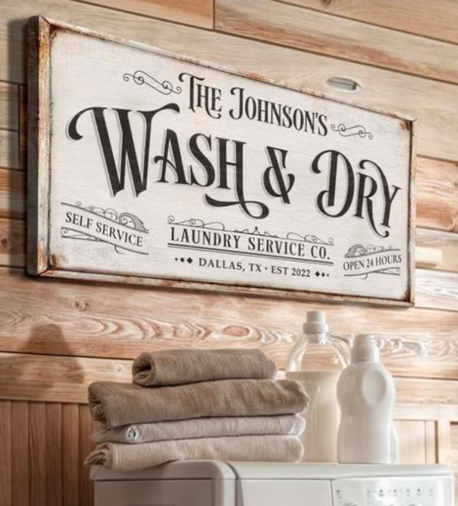 Vintage laundry service sign on wooden wall