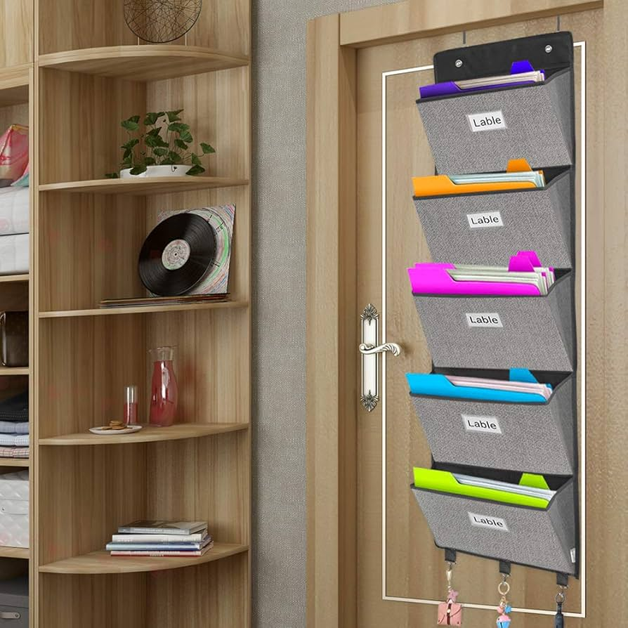 Over-the-door fabric organizer with labeled compartments for documents.