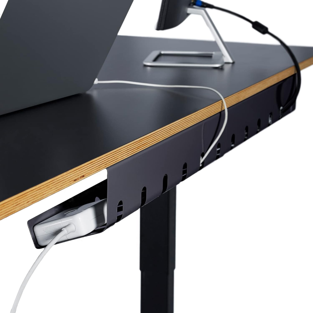 Cable tray under desk with organized wires.