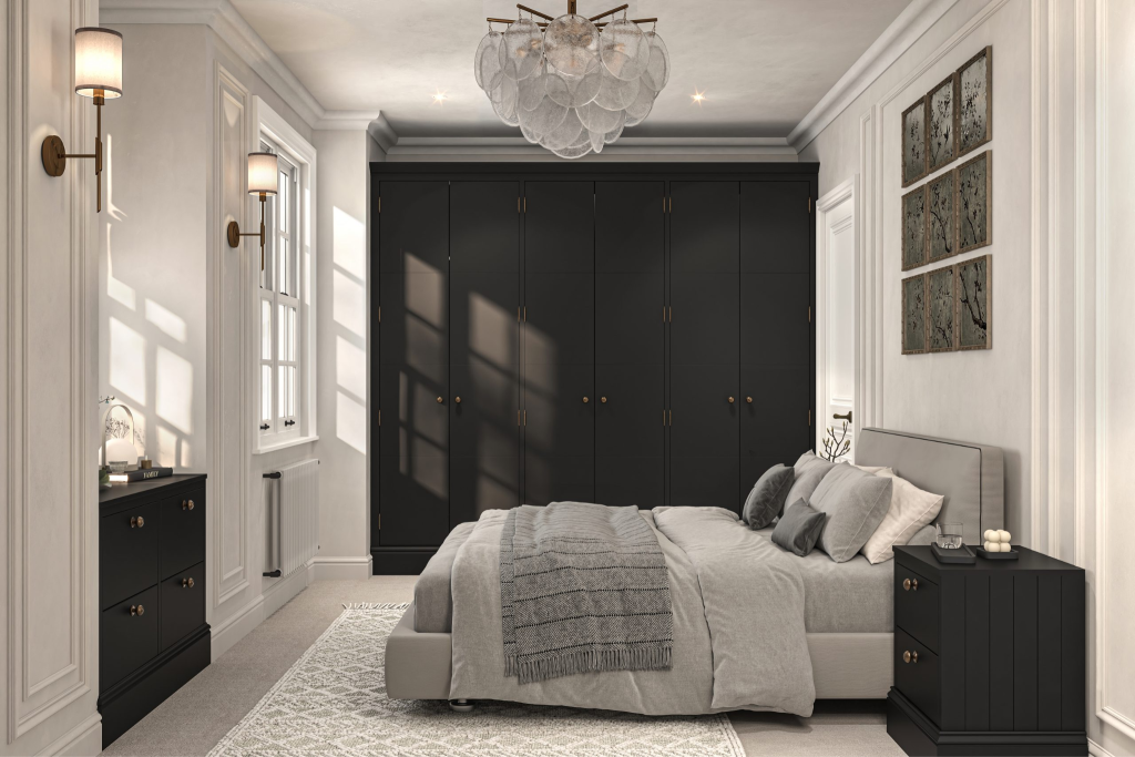 Elegant bedroom with black wardrobes and neutral bedding.

