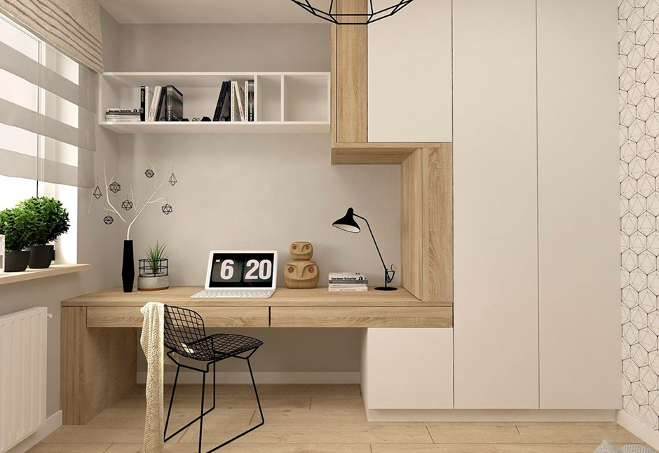 Small home office with built-in desk, minimalist cabinets, and shelving