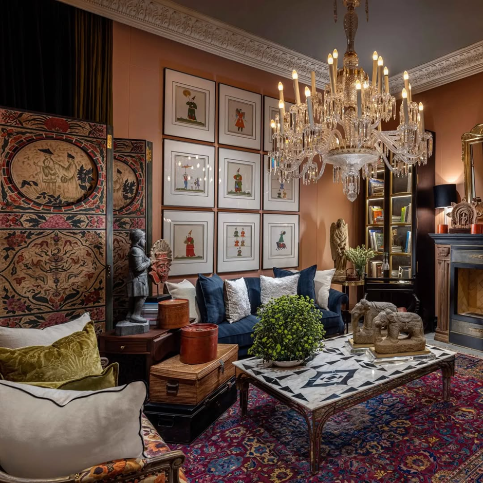 Opulent maximalist living room with crystal chandelier