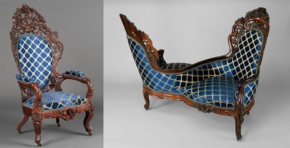 Victorian carved mahogany chair and settee with blue lattice upholstery.