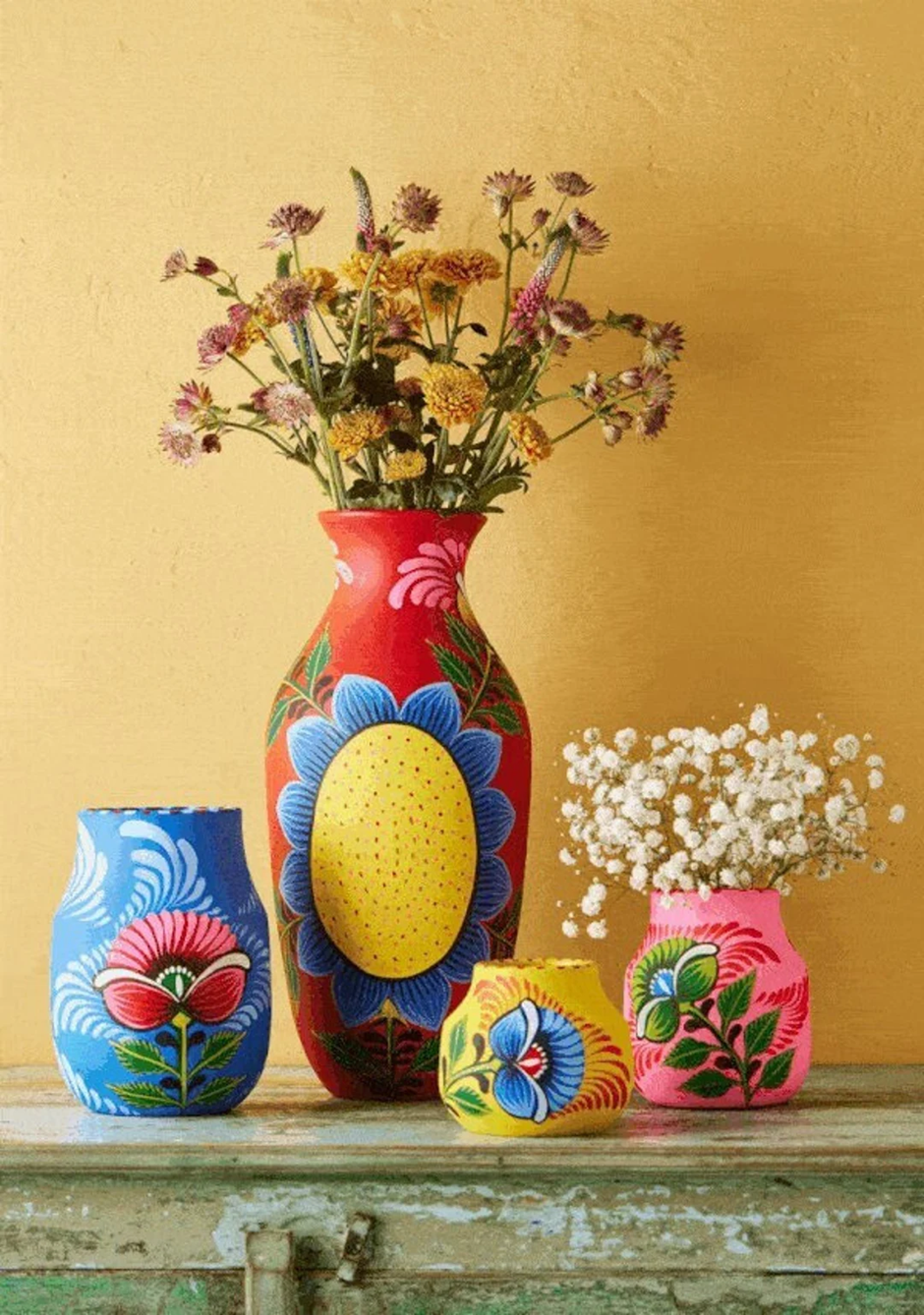 Hand-painted folk-art floral vases with dried blooms, home decor