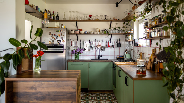Rustic kitchen design with open and tiered shelving to maximize space