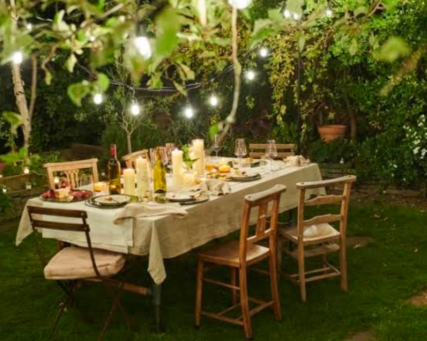 Camp themed backyard table setting.