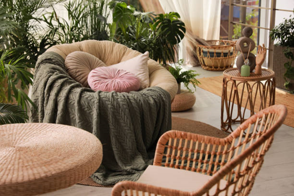 Boho rattan lounge with papasan chair and indoor plants