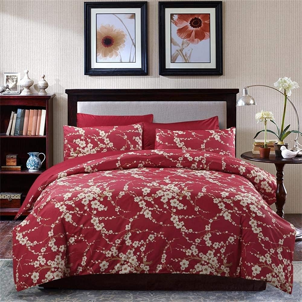 Cherry Red Duvet Cover Set on a bed in a minimalist bed room.