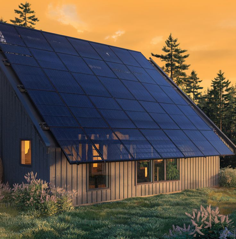 Home featuring full-slope building-integrated solar panel roof at sunset.