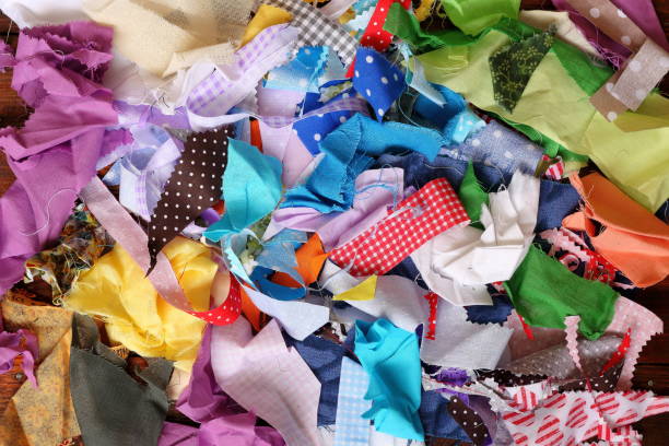 A pile of fabric scraps together in a colorful work of art