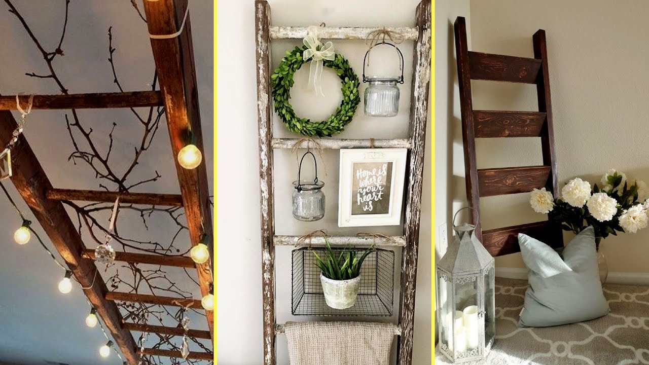 Rustic wooden ladder decor ideas with hanging lights, wreath, and cozy corner display