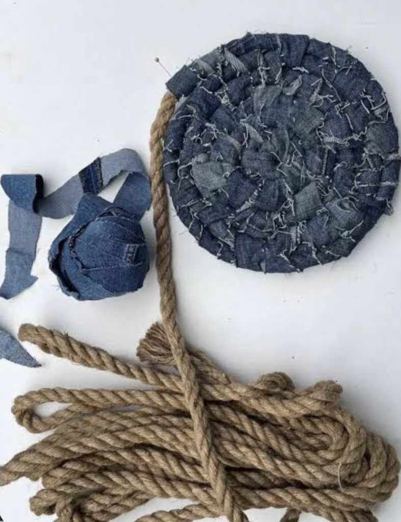materials for diy denim rag rug including fabric strips and rope for handmade rug project